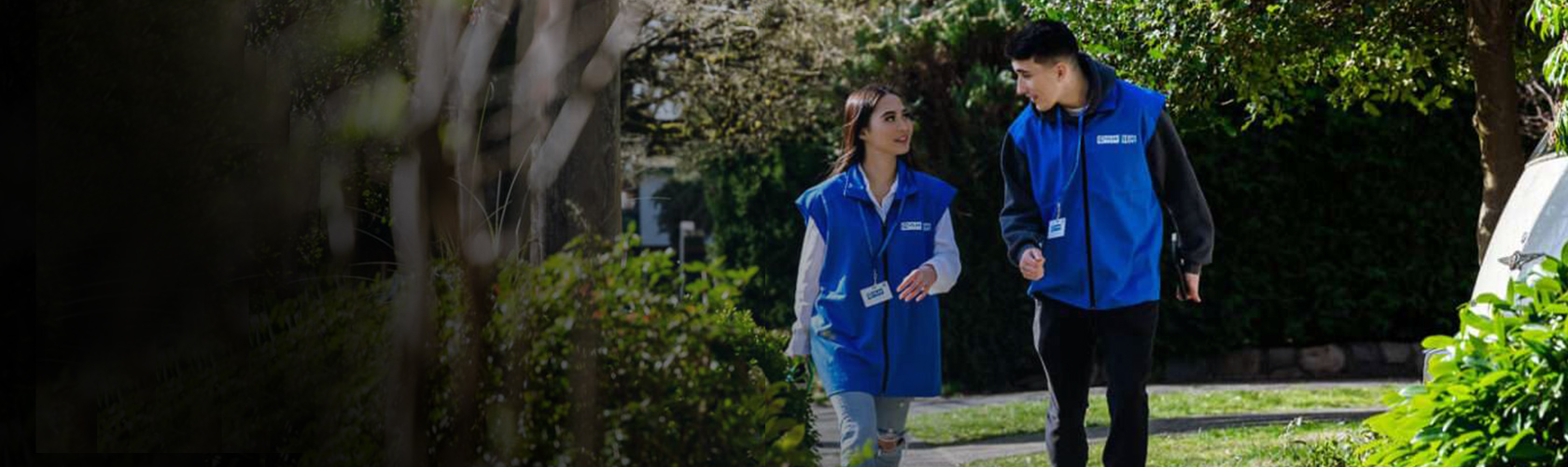 FieldForce representatives walking through a neighborhood
